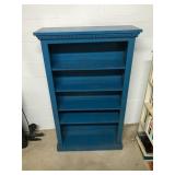 Blue Wooden Bookshelf With Trim
