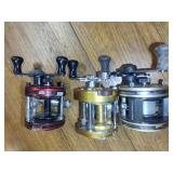 (2) Abu Garcia and (1) Penn Reels