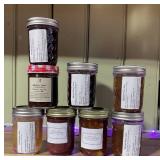 8 Jars of assorted artisanal jams and preserves