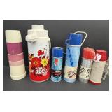 Collection of vintage Thermos and Aladdin vacuum