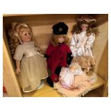 Four Collectible Porcelain Dolls