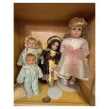 Four Porcelain Dolls
