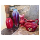 Four Red Ceramic Vessels