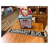 Pink Flamingos and Earnhardt Blvd Sign