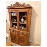 Ornate Wooden Cabinet with Carved Details