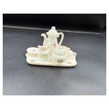 Miniature Ceramic Tea Set with Floral Details