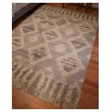 Gray and Cream Area Rug with Fringe