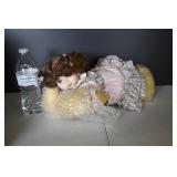 Laying Down Porcelain Doll