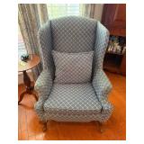 Blue Upholstered Wingback Chair With Pillow