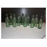 Lot of 10 Vtg Green Coca Cola Embossed Bottles