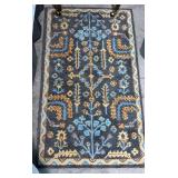 Area Rug with Floral Design
