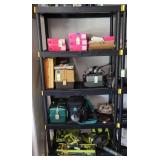 Black Shelving Unit With Contents