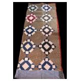 Patchwork Quilt with Geometric Design