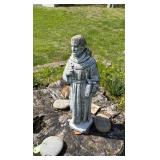 Concrete Statue of a Religious Figure
