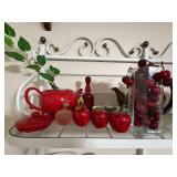 Red and Decorative Teapots with Glass Fruit