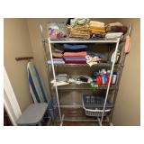 Metal Shelving Unit With Household Items