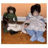 3 Porcelain Face Dolls & 1 Cloth Doll