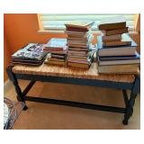 Black Wood Bench With Woven Seat And Books