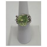 6.75' Peridot Ring with Claw-Like Metal Band