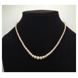 Single-Strand Pearl Necklace with Decorative Clasp