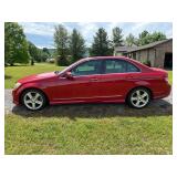 2010 Red Mercedes-Benz C300 4Matic Luxury Sedan