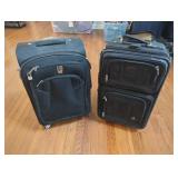 Two Black Luggage Pieces