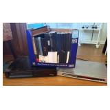 DVD and VHS Players and Box of DVDs and VHS tapes
