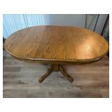 Round Oak Pedestal Dining Table with Sturdy Base