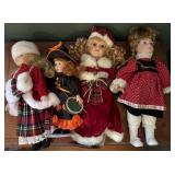 Four Collectible Dolls