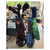 Two Golf Bags with Assorted Clubs and Accessories
