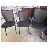 Three Black Mesh Office Chairs