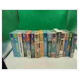 15 Sports VHS Tapes, 1 Video Game