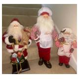 Three Santa Figurines