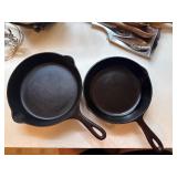 Two Cast Iron Skillets