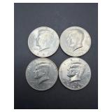 Four Kennedy Half Dollar Coins