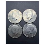 Four Kennedy Half Dollar Coins