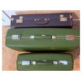 Three Hard-Shell Suitcases