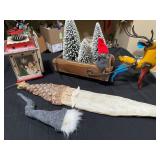 Holiday Decor Including Reindeer, Gnome, and Lante