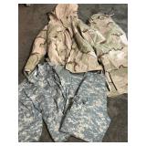 Wooden Box with Military Rain Gear and Camo Clothi