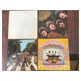 Four Beatles Vinyl Records