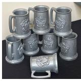 Eight Aluminum Tankards with Eagle Relief