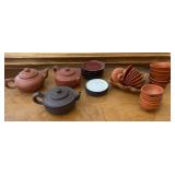 Clay Teapots, Tea Cups, and Saucers