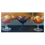Three Carnival Glass Compotes