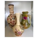 Three Ceramic Vases with Floral Motifs