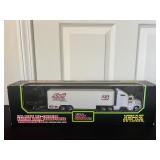 1:64 Die-Cast Racing Team Transporter 16