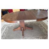 Oval Wooden Dining Table with Pedestal Base