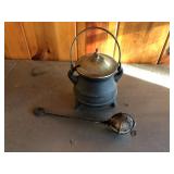 Vintage footed cast iron smelter pot w/ ladel