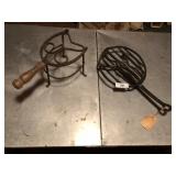 Exhibited Antique cast iron cooking trivets