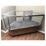 Double corner glass show case with storage