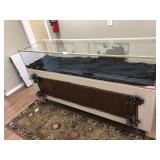 Glass show case with storage